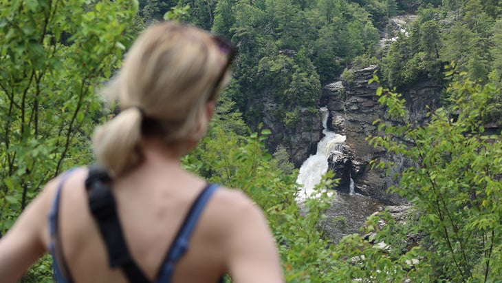 woman views Linville falls, North Carolina