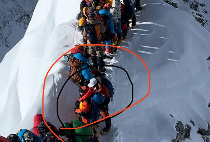 Climbers stand in a traffic jam on Mount Everest