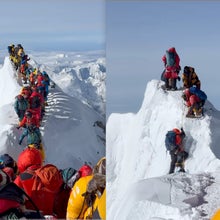 Climbers ascend a ridge on Mount Everest