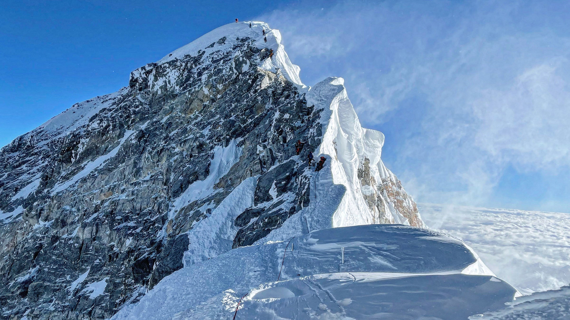 Mount Everest's summit is blown by high winds.