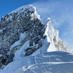 Mount Everest's summit is blown by high winds.