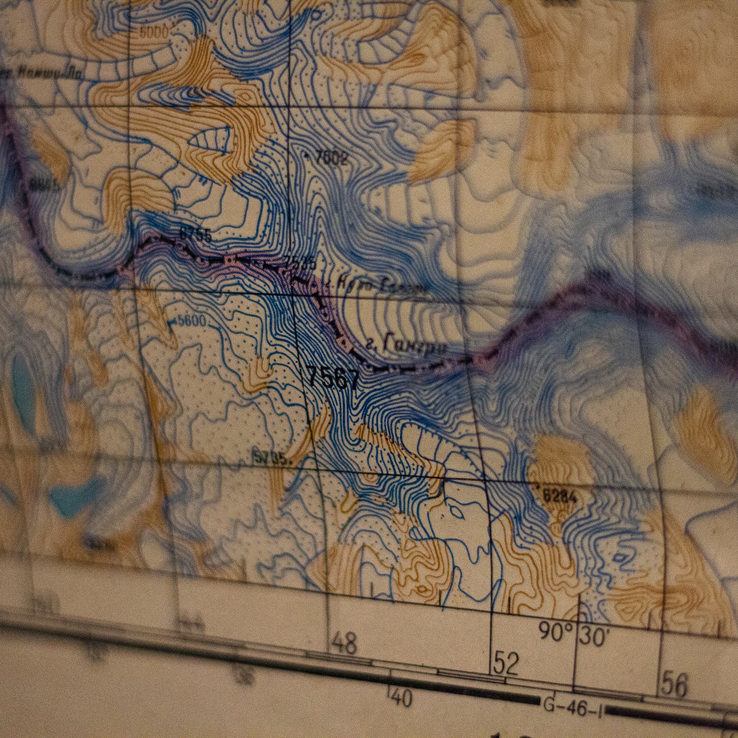 An old Russian-language map, produced during the Soviet era, is one of several which adorn the walls of Jurgalski’s apartment. This shows the China Bhutan border, site of the highest unclimbed mountain in the world.