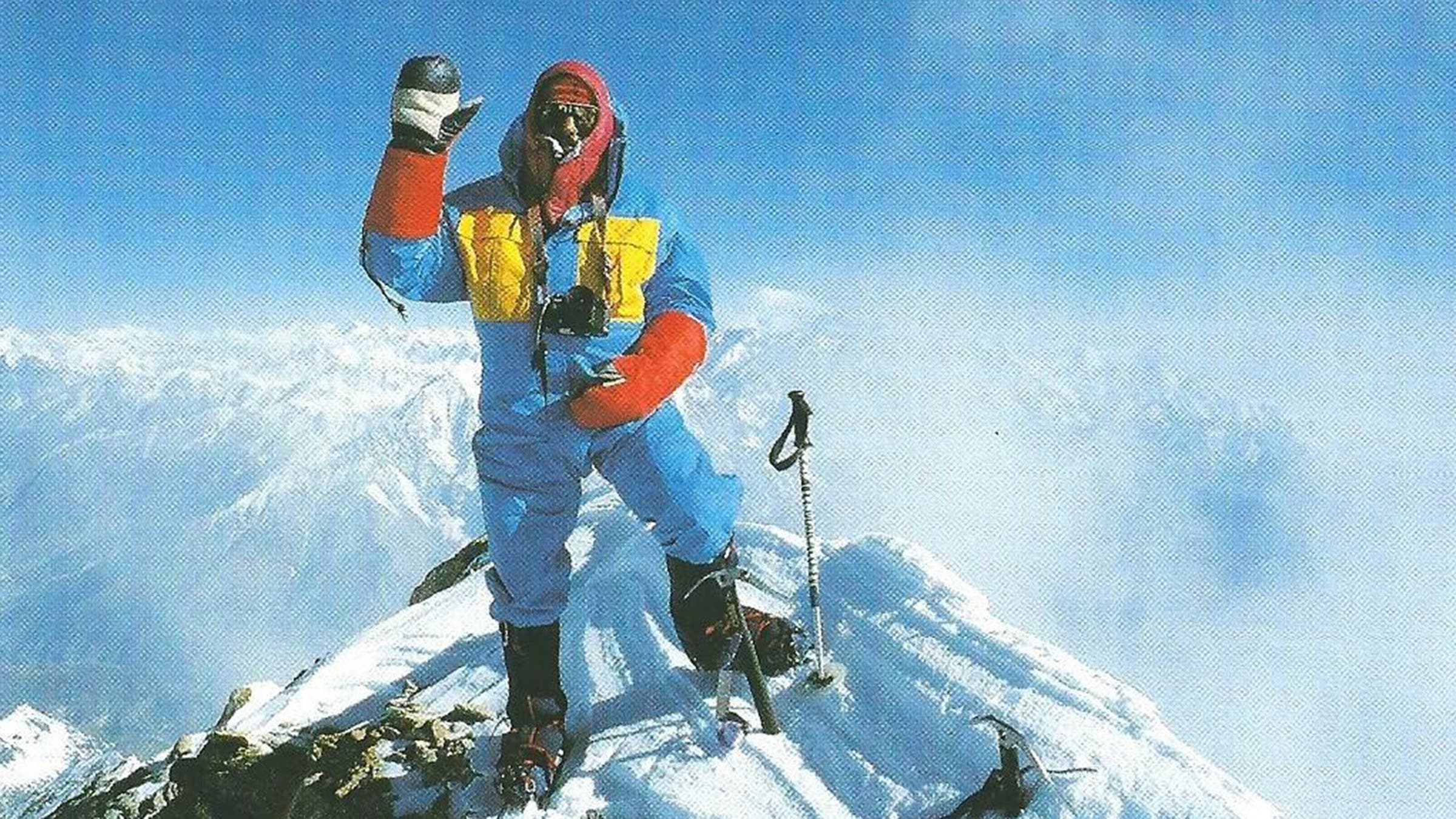 A photo showing the Swiss mountaineer Erhard Loretan celebrating on what he believed was the summit of Dhaulagiri.