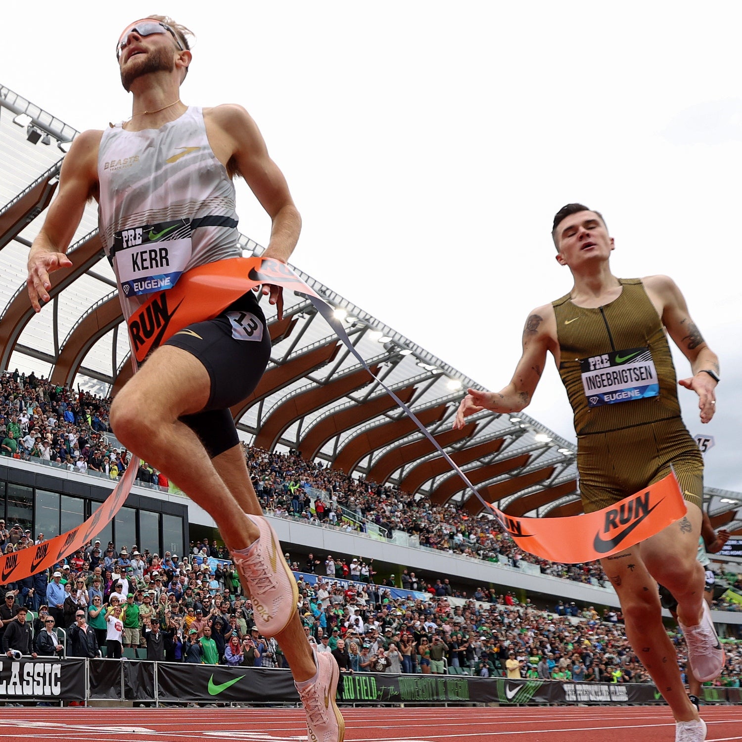 Scotland's Josh Kerr and Norway's Jakob Ingebrigsten cross the finish at the 2004 Prefontaine Classic