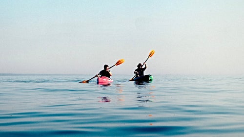 two people kayaking