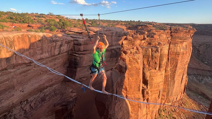 student learns highlining in Moab