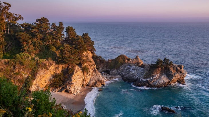 Spectacular scenery at Julia Pfeiffer Burnes State Park—a turquoise cove of the Pacific, cliffs, and an 80-foot-high waterfall—on the Big Sur coast makes this an incredibly popular camping destination.