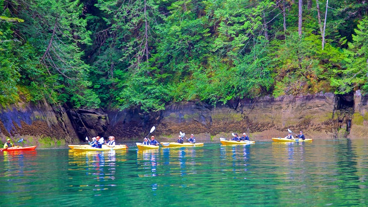 people in kayaks at Misty Fjords National Monument, Alaska