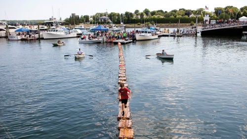 A teen shows how it’s done at the International Great Crate Race.