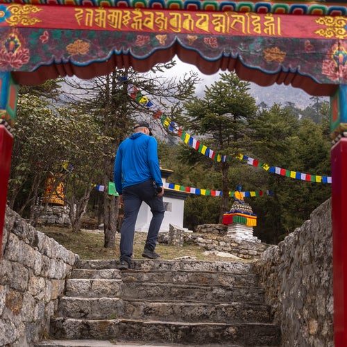 The author entering a park in the village of Khunde