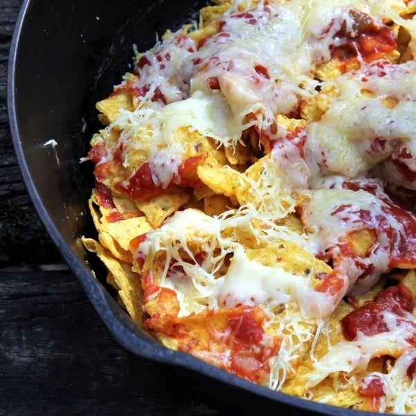 Camping nachos in a cast-iron skillet