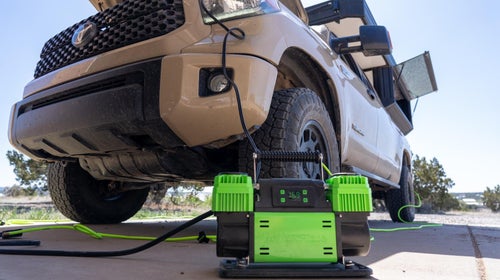 Closeup of MORRFlate TenSix PSI Pro air compressor inflating Toyota truck tires