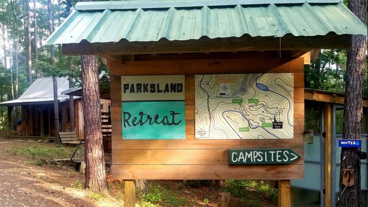 Signage at Parksland Retreat, a Hipcamp site in Alabama