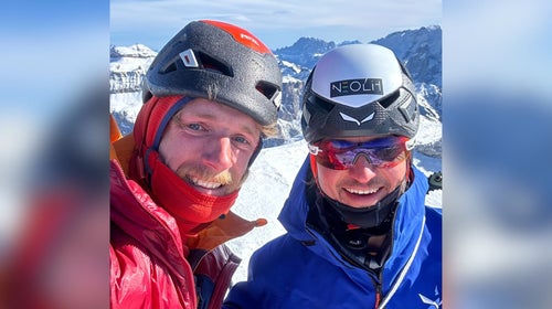 Free solo climber Martin Feistl (left) and Simon Gietl on the summit after the first ascent of 'Aura' (AI 5 M6; 3,900ft) in the Italian Dolomites.