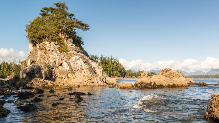 woman stops to view sea stacks in the Broken Group Islands