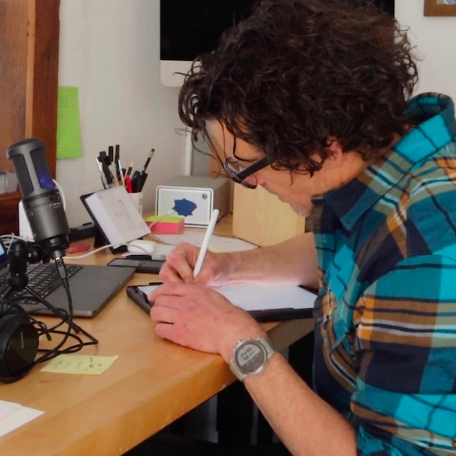 Brendan Leonard sitting at his writing desk.