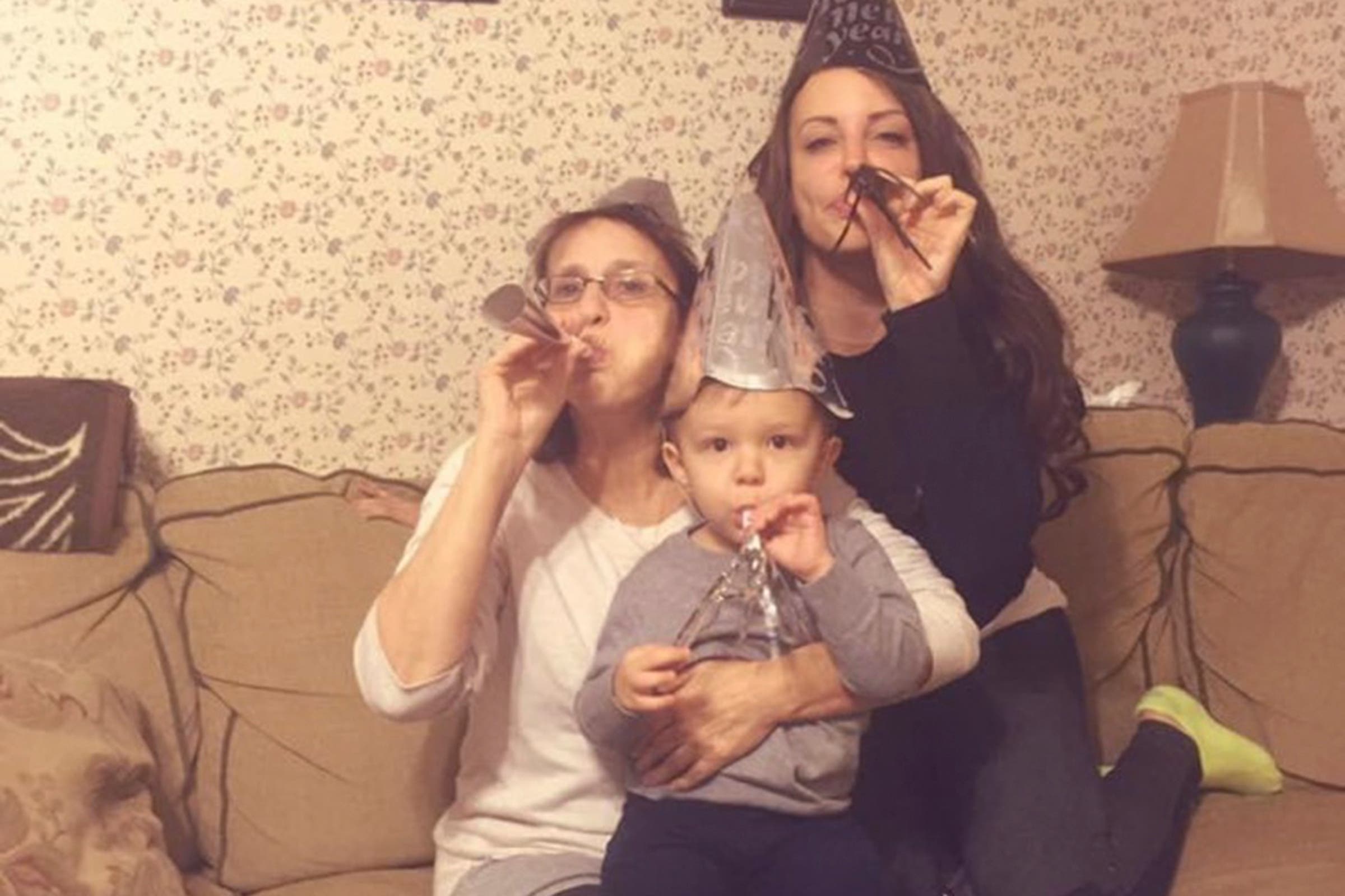 Two women and a child celebrate new year's