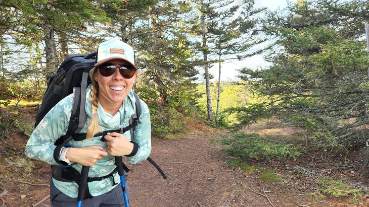 Outside’s senior travel editor Patty Hodapp pauses for a breather on Isle Royale’s Greenstone Ridge Trail