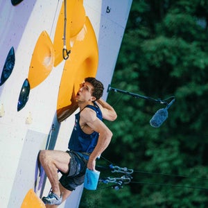 Olympic climber Jesse Grupper working hard on an IFSC World Cup lead route in 2022
