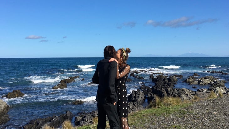 Olivia and her husband, Cam, getting married on the ocean.