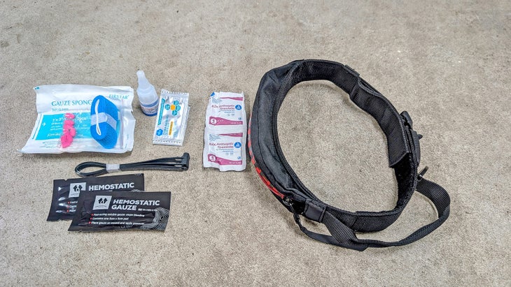 A dog collar with first aid supplies