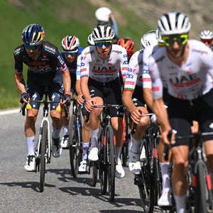 VALLOIRE, FRANCE - JULY 02: (L-R) Primoz Roglic of Slovenia and Team Red Bull – BORA – hansgrohe and Tadej Pogacar of Slovenia and UAE Team Emirates compete in the breakaway during the 111th Tour de France 2024, Stage 4 a 139.4km stage from Pinerolo to Valloire / #UCIWT / on July 02, 2024 in Valloire, France. (Photo by Dario Belingheri/Getty Images)