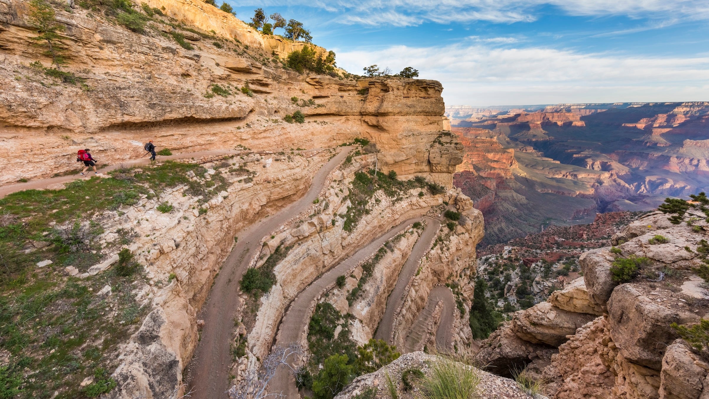 Hikers descend the South Kaibab Trail in Grand Canyon National Park rim to rim