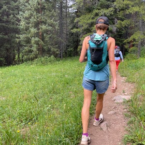 woman hiking in jean shorts