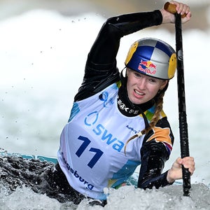 A kayaker navigates rough whitewater