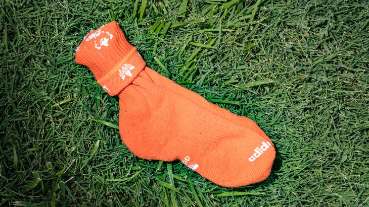 Bright orange Adidas running socks