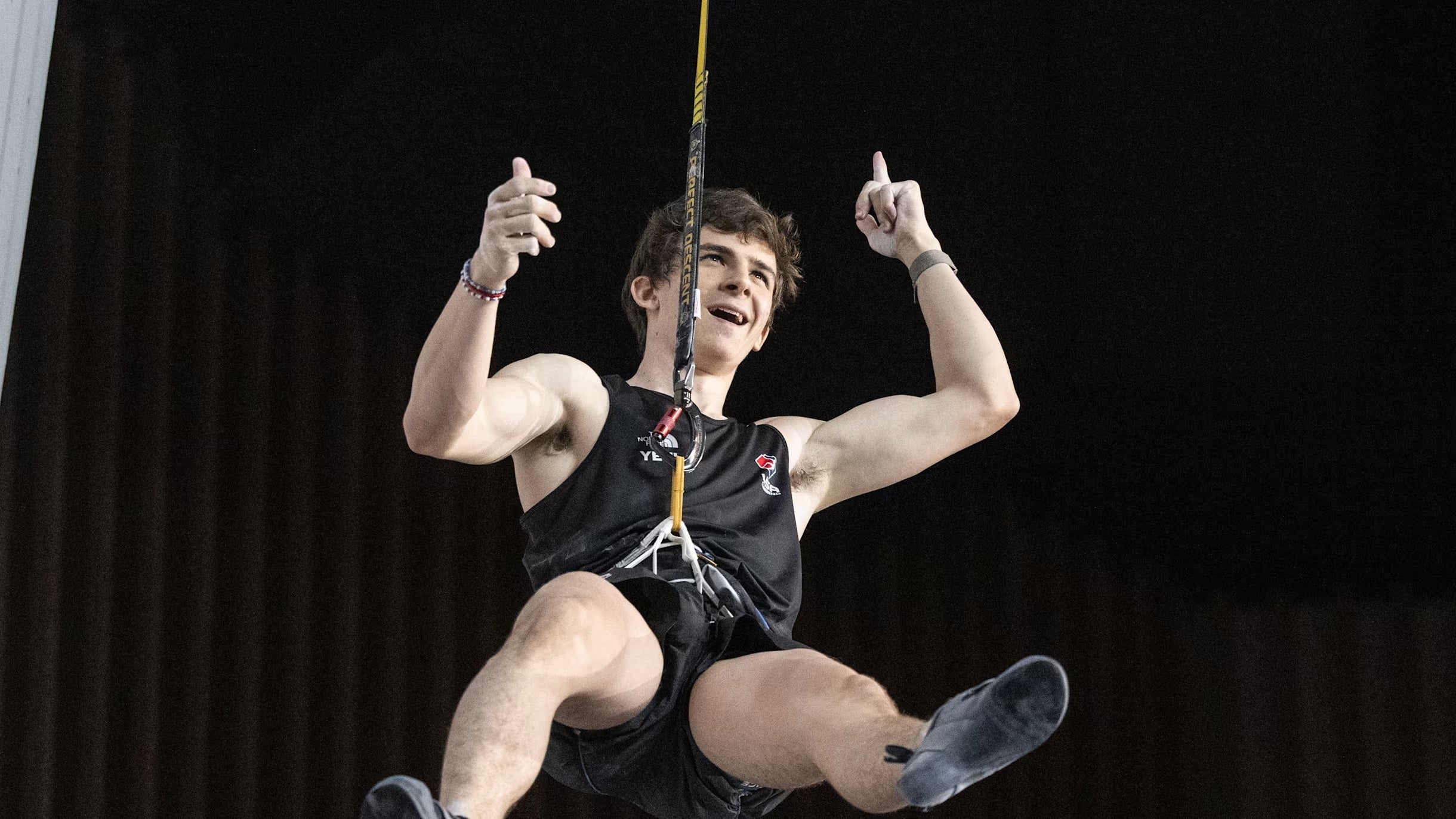 Sam Watson, a favorite speed climber at the Paris Olympics, lowers of the speed wall.