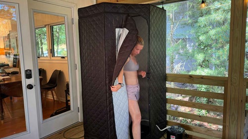 Author Graham Averill's wife tests out the SaunaBox.