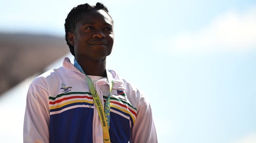 Bronze medallist Namibia's Christine Mboma poses during the medal ceremony for the women's 200m athletics event at the Alexander Stadium, in Birmingham on day ten of the Commonwealth Games in Birmingham, central England, on August 7, 2022.