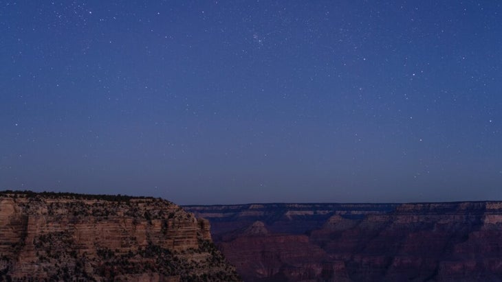 A clear, star-filled night sky above the Grand Canyon’s South Rim