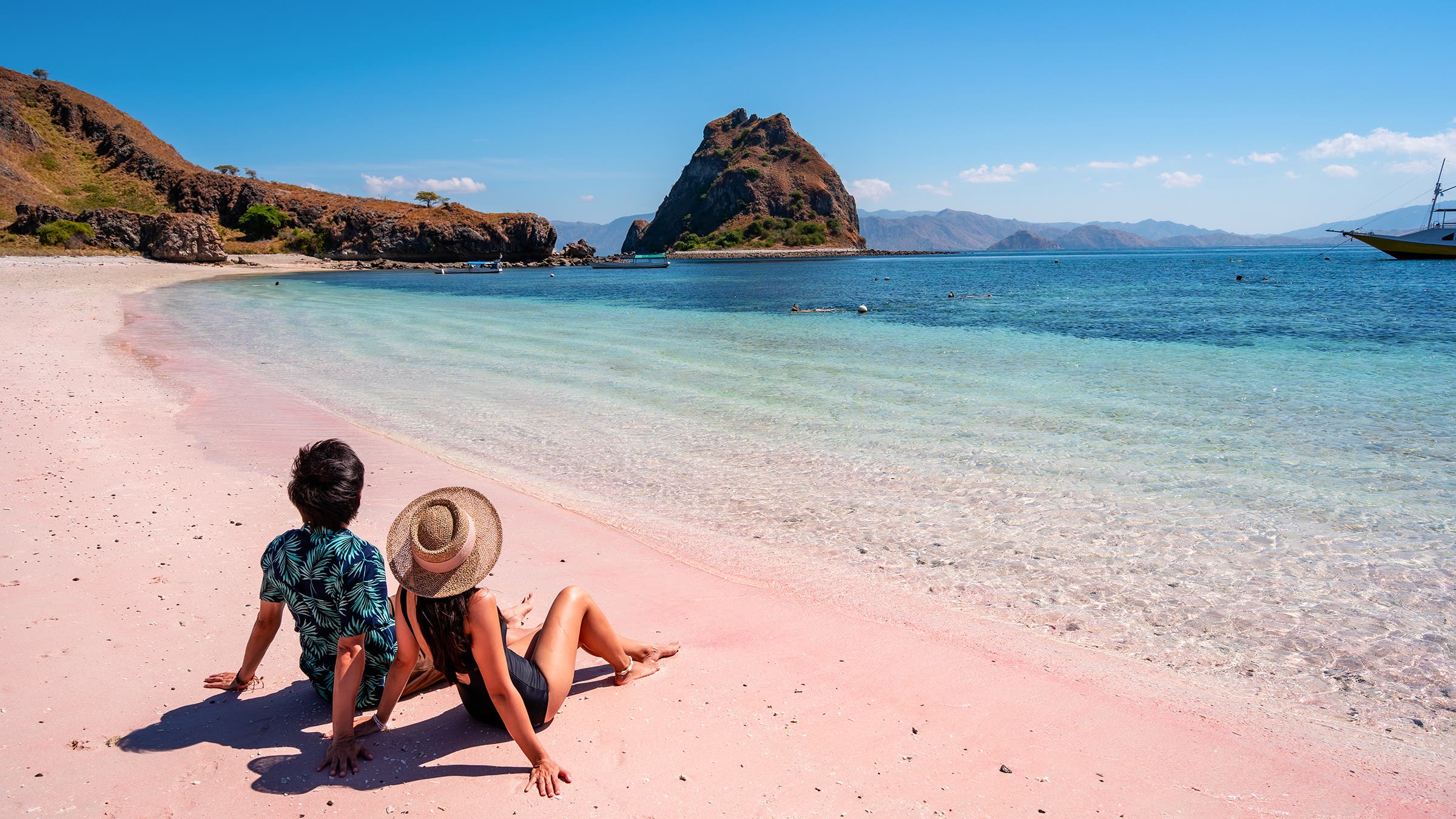 Pink sand, the effects of a microorganism, on Pantai Merah, Indonesia