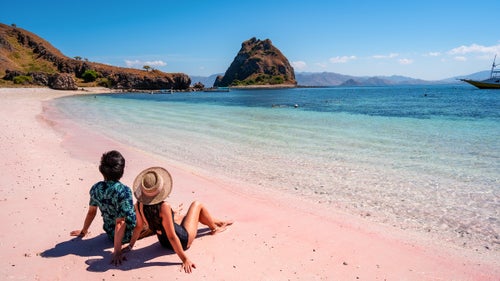 Pink sand, the effects of a microorganism, on Pantai Merah, Indonesia