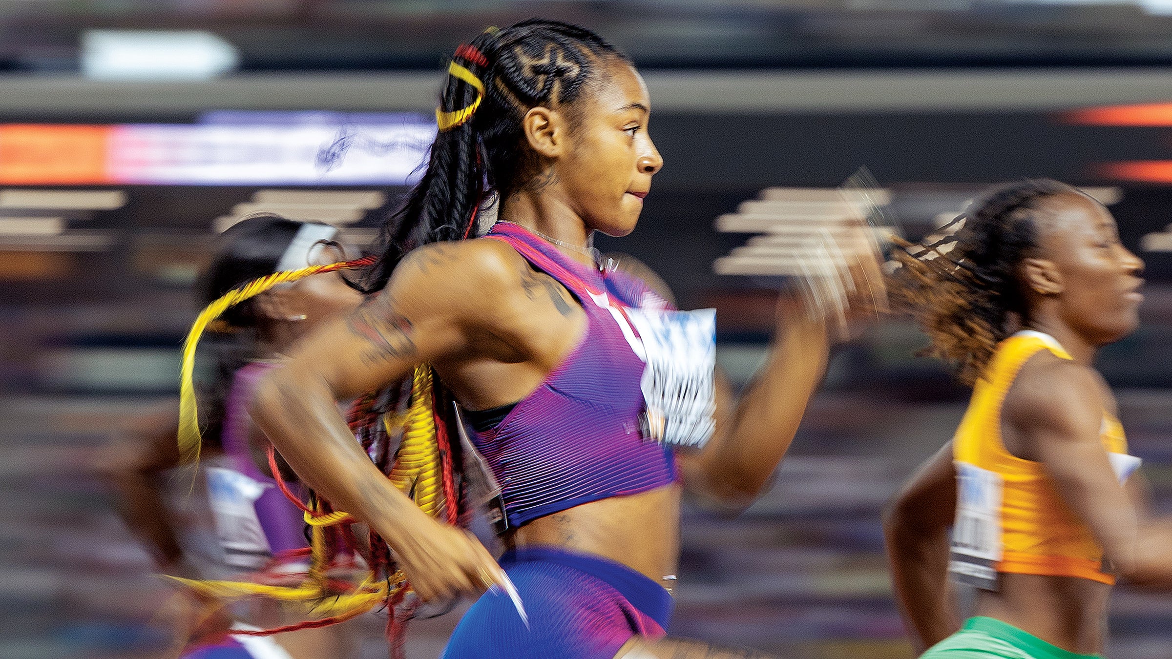 American sprinter Sha’Carri Richardson (center) aims for perfect running form.