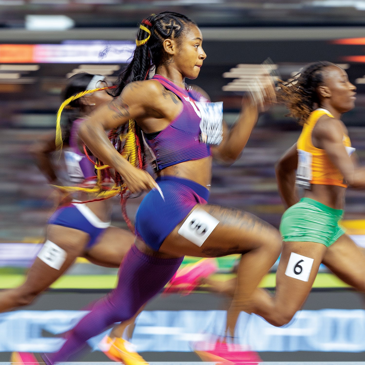 American sprinter Sha’Carri Richardson (center)