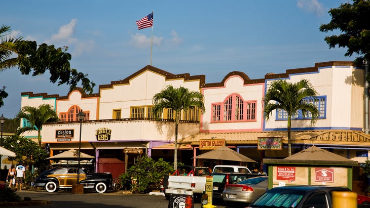 Trees, jeeps, and beachtown in Halewa