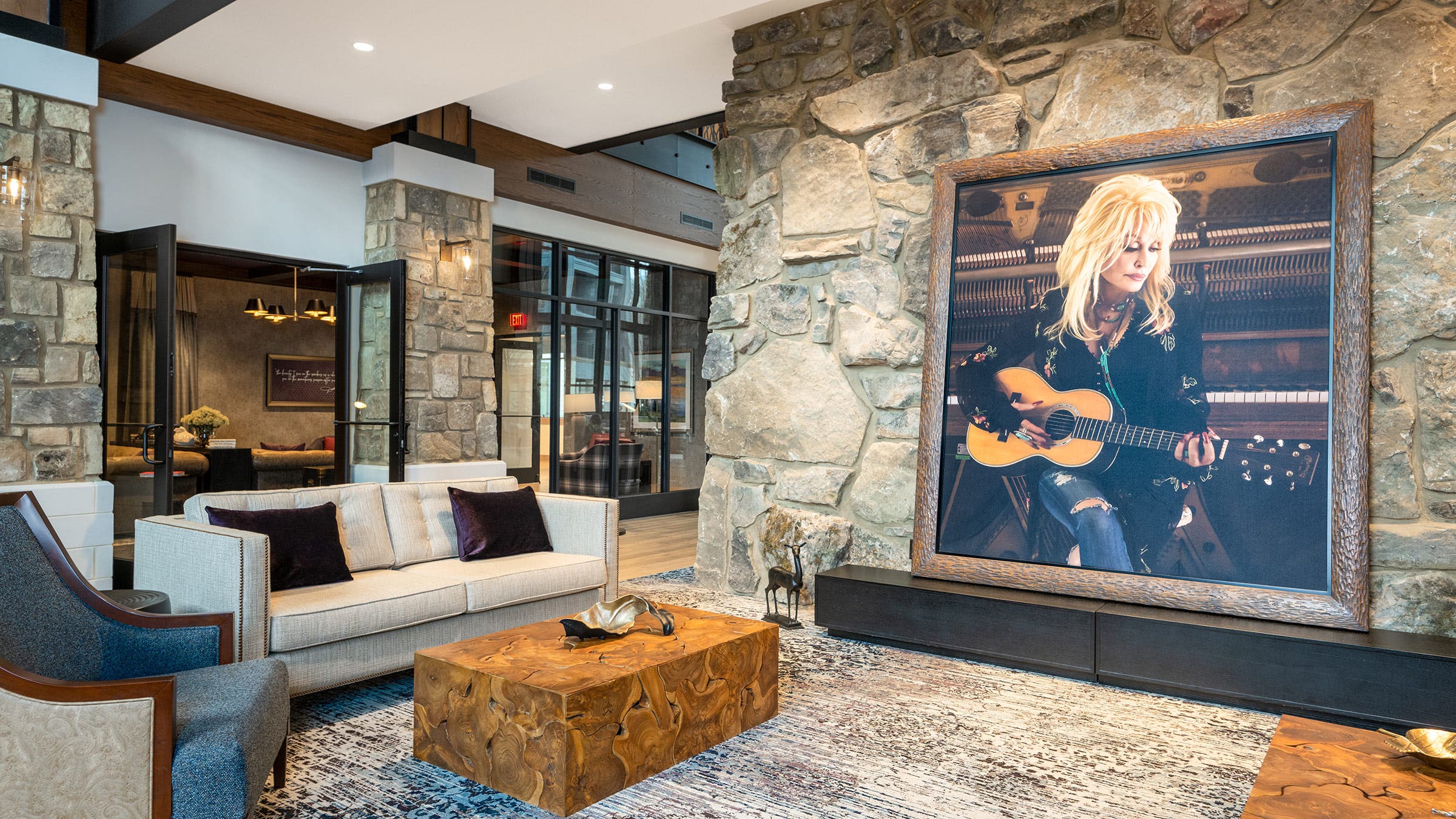 lobby and image of Dolly Parton at HeartSong Lodge