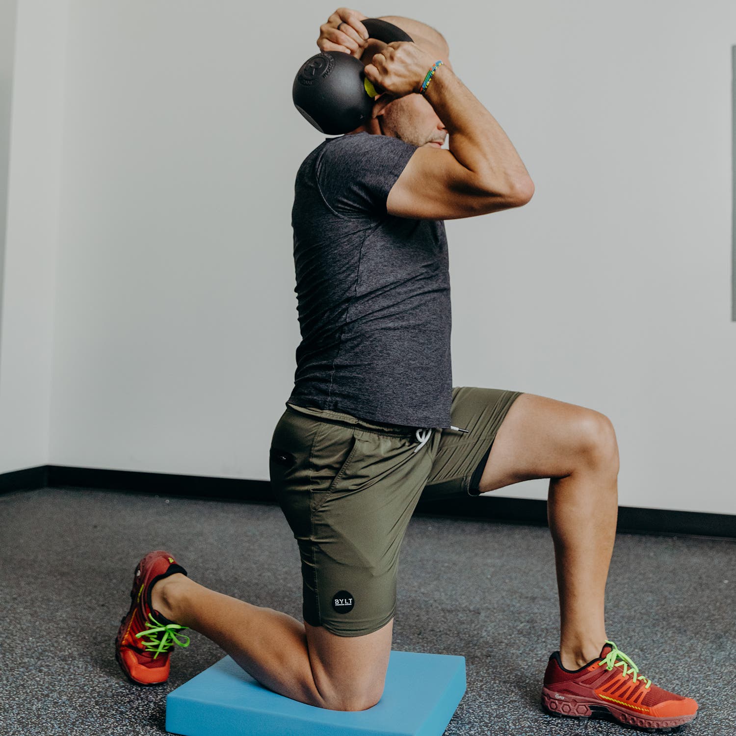 Attia lifting a kettlebell
