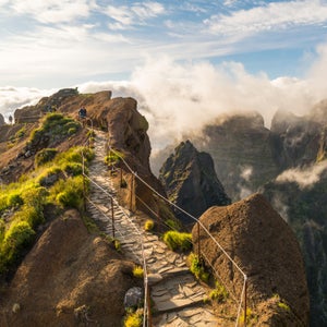 Hikers walking on Pico do Arieiro trail, Madeira, Portugal