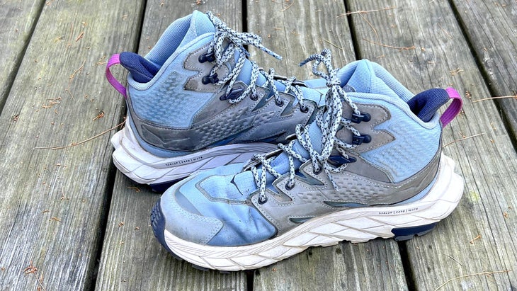 Thrifted blue Hoka hiking boots