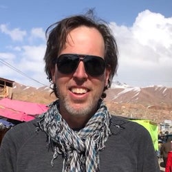 The author wearing sunglasses and a scarf