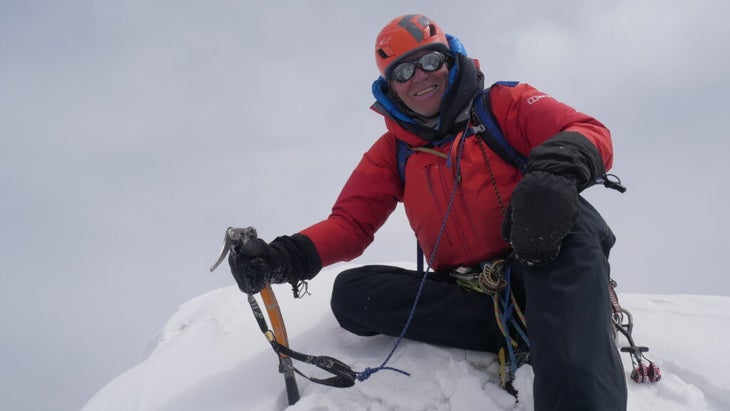 Mick Fowler poses on the summit of Yawash Sar.