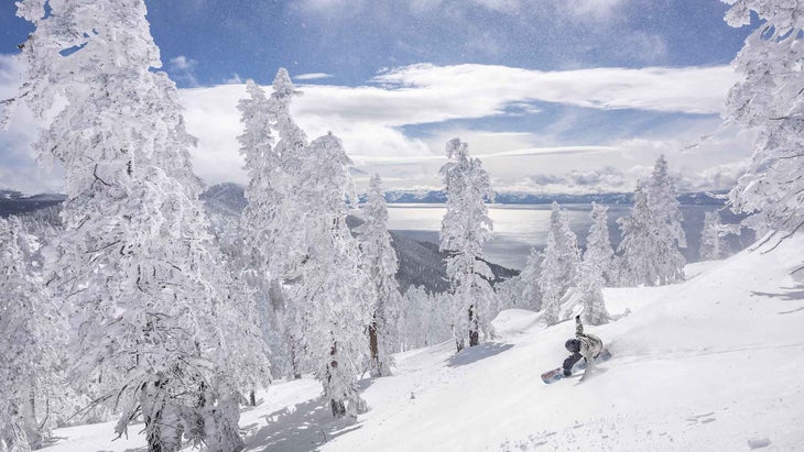 Woman snowboarding on the Gnu Barrett