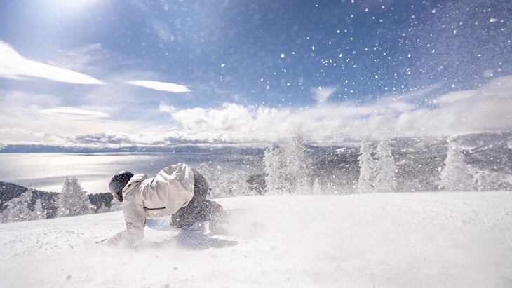 Woman snowboarding on the Gnu Barrett