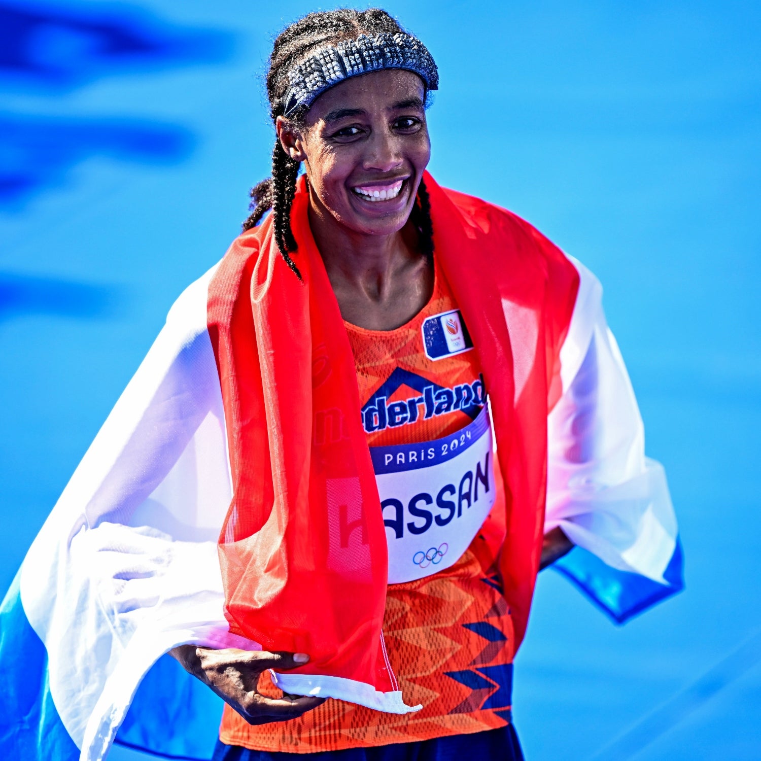 Sifan Hassan of Team Netherlands celebrates after winning the women's marathon at Esplanade des Invalides during the 2024 Paris Summer Olympic Games in Paris, France.