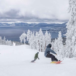 Two snowboarders