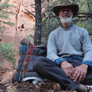 A man sitting in the forest